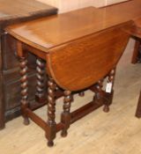 A 1920's oak gateleg table W.75cm
