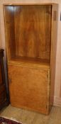 An Art Deco figured walnut bookcase W.61cm