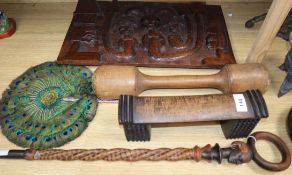 An African hardwood pillow, a walking stick and other ethnographic carvings etc