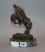 After Frederic Sackrider Remington (American 1861-1909). A bronze, 'The Outlaw' height 21.5cm