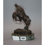 After Frederic Sackrider Remington (American 1861-1909). A bronze, 'The Outlaw' height 21.5cm