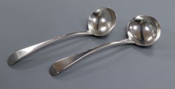 A pair of George III silver Old English pattern sauce ladles, London, 1801.