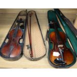 A German Strad style violin and a small violin and two bows