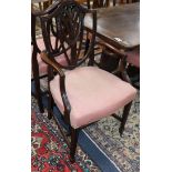 A set of eight Hepplewhite style mahogany dining chairs (two with arms)