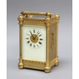 An early 20th century French brass carriage timepiece, cased height 10cm excl. handle