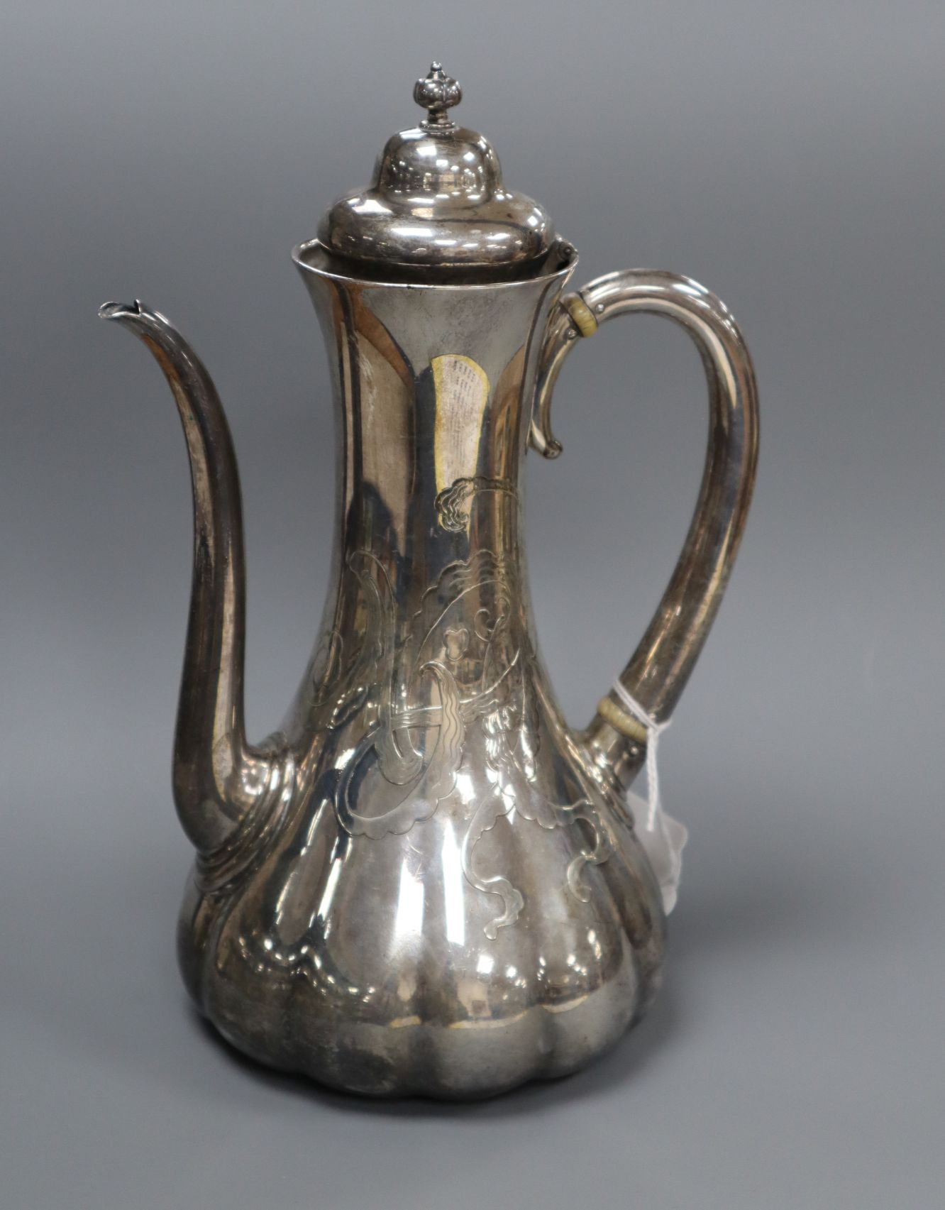 A late 19th century Tiffany & Co sterling hot water pot, engraved with ornate monogram, 22.5cm,