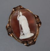 A Victorian yellow metal mounted oval cameo shell pendant brooch, carved with the figure of Pallas