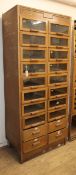 An early 20th century 'Dudley & Co.' twenty drawer shop cabinet W.85cm