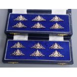 A set of twelve modern pierced scroll silver menu holders, by Mappin & Webb, Birmingham, 1988, in