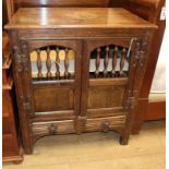 A 17th century style oak 'hutch' cupboard W.83cm