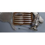 A late 1950's silver sugar caster, a silver hand mirror, a pair of silver sugar tongs, a silver