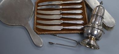 A late 1950's silver sugar caster, a silver hand mirror, a pair of silver sugar tongs, a silver