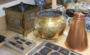 A brass planter, a jardiniere and copper pot