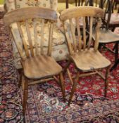 A pair of Victorian Windsor lathe back kitchen chairs