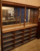 A late Victorian mahogany shop cabinet W.214cm