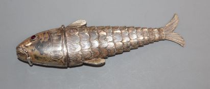 An Edwardian Hanau silver reticulated fish pill box, with cabochon eyes, import marks for London,