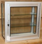 An aluminium and glass table-top display cabinet W.43cm