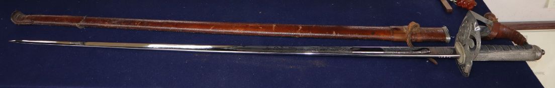 A George V Scots Guards officer's dress sword, which belonged to Major W. L. Greenlees, see