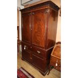 A George IV mahogany hanging wardrobe W.125cm