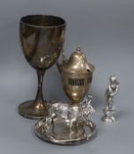 A Victorian silver goblet, a silver mustard pot, two Middle Eastern dishes, a model cow and a