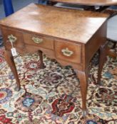 An 18th century oak and pollard oak lowboy W.74cm