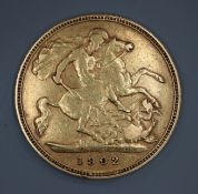 An Edward VII 1902 gold half sovereign.