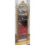 An Edwardian gilt arched pier glass W.35cm, H.126cm