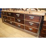 A Victorian oak and mahogany twelve drawer shop counter L.220cm