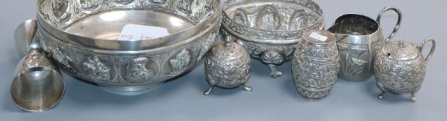 An Indian embossed white metal bowl, A. Bhica Jee & Co, Bombay, four Indian white metal
