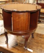 A 1920's piecrust mahogany revolving bookcase Diameter 52cm