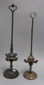 Two bronze 'rise and fall' oil lamps