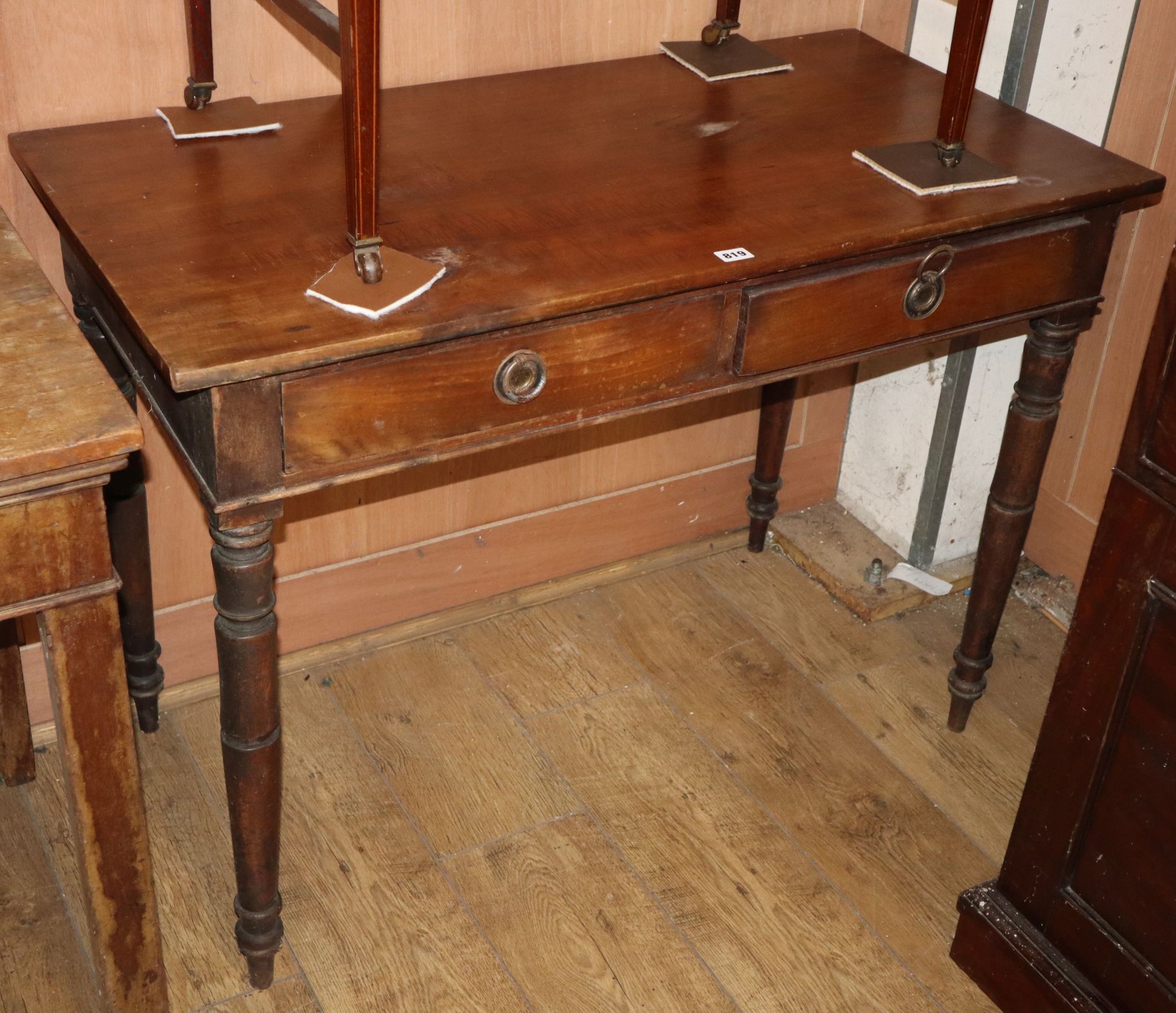 An early Victorian mahogany two drawer side table W.105cm