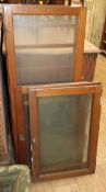 Five glazed cabinet doors, one branded Meccano Larger 118 x 48cm