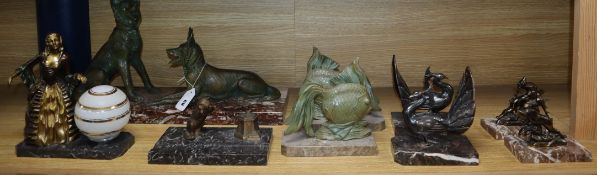 Art Deco patinated spelter figures comprising three pairs of bookends, one inkwell and lamp and a