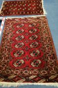 Two Bokhara red ground rugs Larger 157 x 110cm