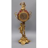 A German gilt metal figural mantel timepiece height 57cm