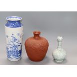 A Chinese crackleglaze vase, blue and white vase and a redware vase tallest 27cm