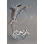 A cased Swarovski dolphin height 20cm