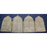 A 19th century Russian cast brass tetraptych icon
