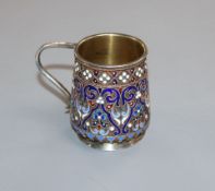 A late 19th century Russian 84 zolotnik gilt and cloisonne enamel small mug, assay master, RC?, 1888