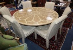 A fossilised marble table and six chairs Diam.164cm