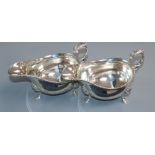 A pair of George V silver sauceboats, George Howson Sheffield, 1931, 17.5 oz.