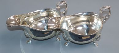 A pair of George V silver sauceboats, George Howson Sheffield, 1931, 17.5 oz.