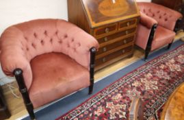 A pair of continental upholstered tub lounge chairs