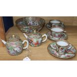 A group of mid 19th century Chinese famille rose tea wares and a bowl