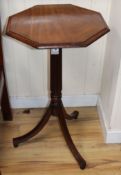 A pair of George III style octagonal mahogany tripod tables W.44cm