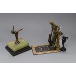 A Bergmann style cold painted bronze group, an Art Deco bronze figure bathing belle and two bronze