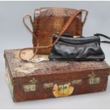 A small crocodile case and two handbags