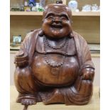 A large carved hardwood Buddha height 54cm