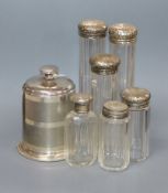 A George V engine turned silver cigarette dispenser, Birmingham, 1935 and six silver lidded glass